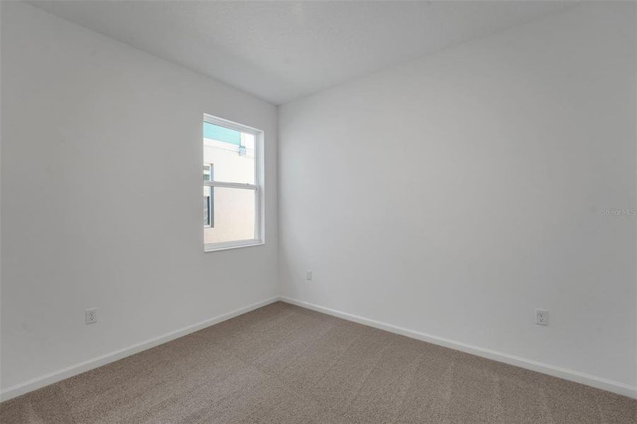 Spacious, unfurnished interior of a new home in Willowbrook North, Winter Haven (Image 30).