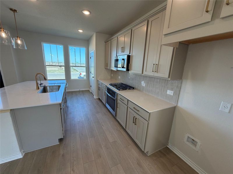 Furnished interior view inside a new home in Lariat, Liberty Hill (Image 8). Furnished interior view inside a new home in Lariat, Liberty Hill (Image 8).