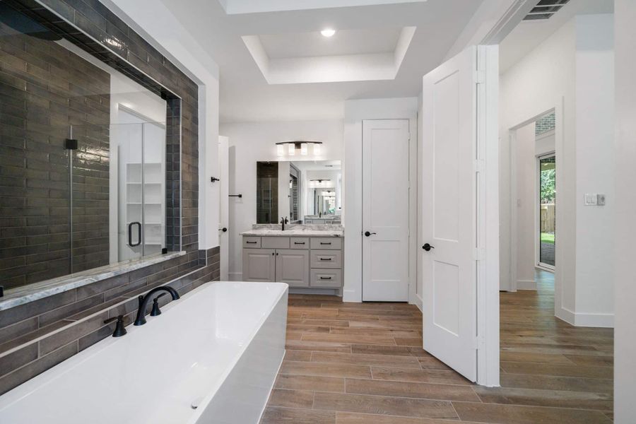 Representative furnished interior of a home built from the Waterloo 60′ Lot by Chesmar Homes in Fulshear Lakes, Fulshear (Image 9).