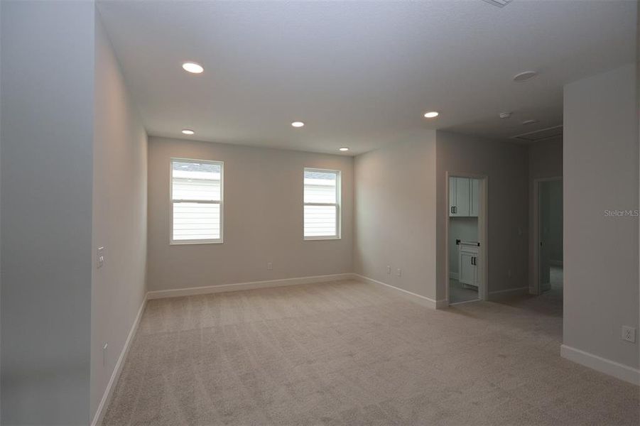 Spacious, unfurnished interior of a new home in Lake Star at Ovation, Winter Garden (Image 26).