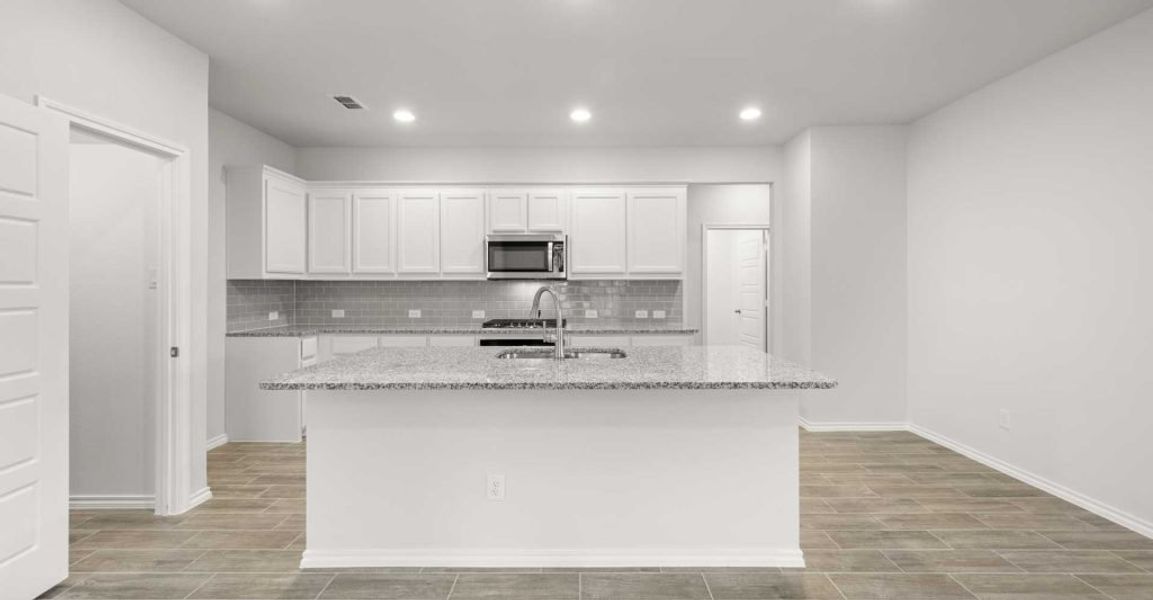 Representative exterior photo of a completed home built from the Dozier by Impression Homes in Redden Farms, Midlothian, TX (Image 7). Representative exterior photo of a completed home built from the Dozier by Impression Homes in Redden Farms, Midlothian, TX (Image 7).