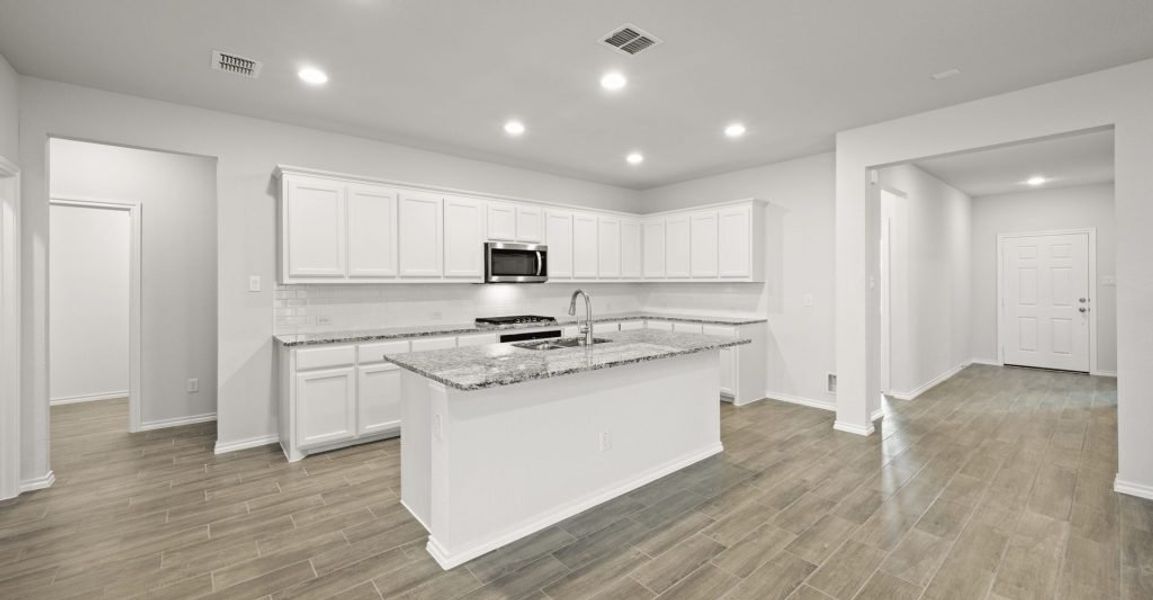 Representative exterior photo of a completed home built from the Oliver by Impression Homes in Redden Farms, Midlothian, TX (Image 7). Representative exterior photo of a completed home built from the Oliver by Impression Homes in Redden Farms, Midlothian, TX (Image 7).