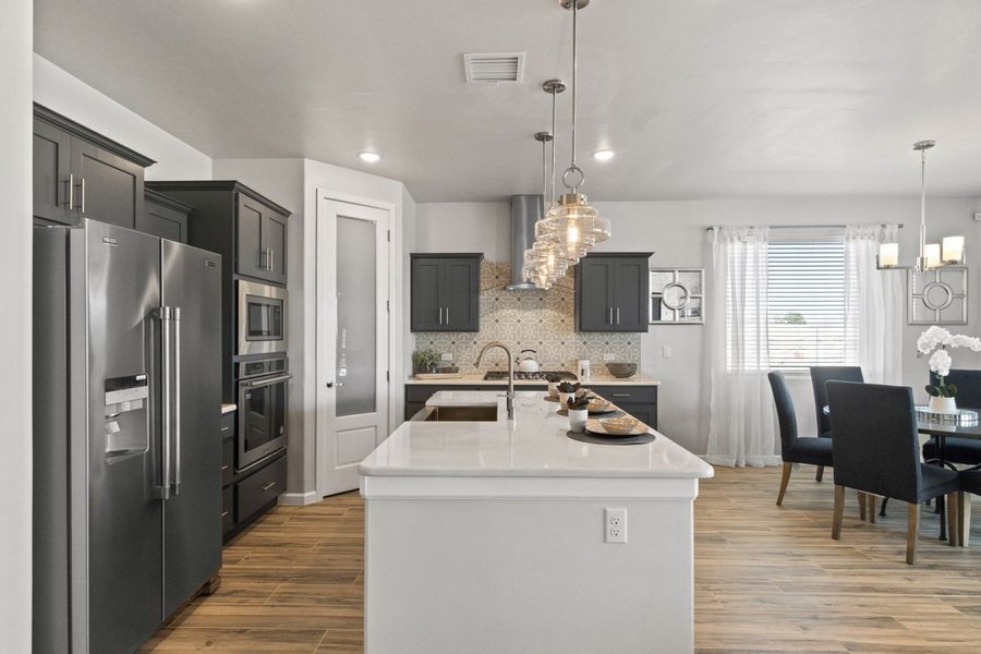 Representative furnished interior of a home built from the Valencia by Hakes Brothers in Hillside Park, El Paso (Image 8).