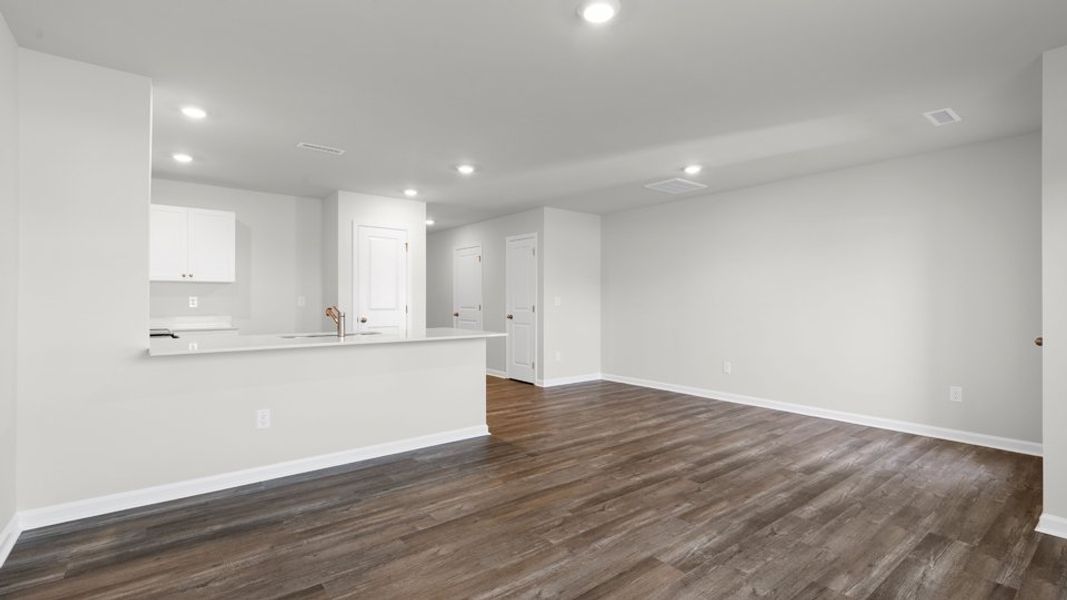 Spacious, unfurnished interior of a new home in The Townes at Belle Grove, Wendell (Image 12).