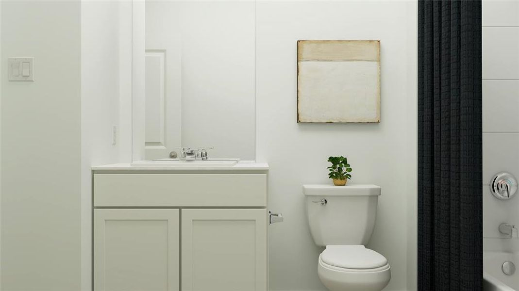 Bathroom featuring shower / tub combo with curtain and vanity