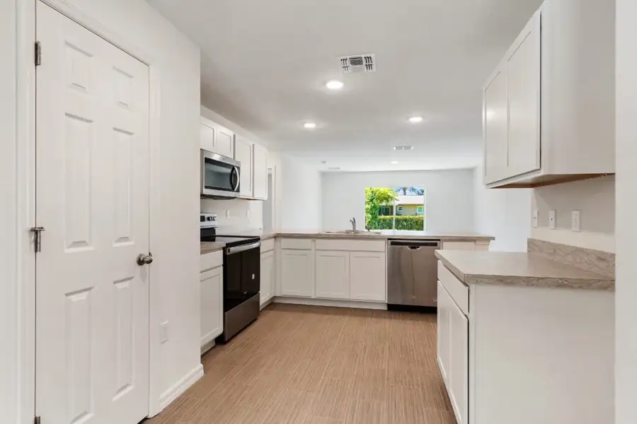 Representative furnished interior of a home built from the Foxtail by Holiday Builders in Port St Lucie, Port St. Lucie (Image 4).