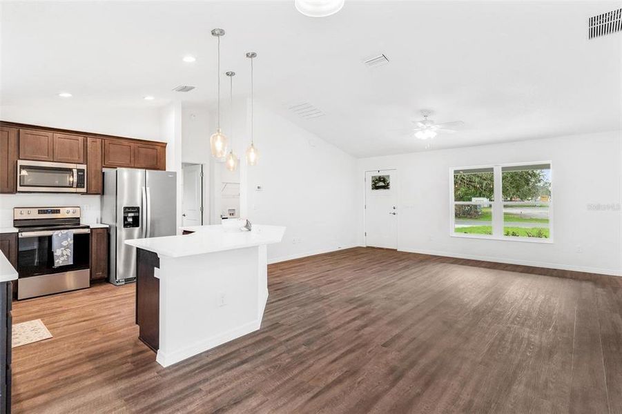 Dining Area overlooking Living and Kitchen Area