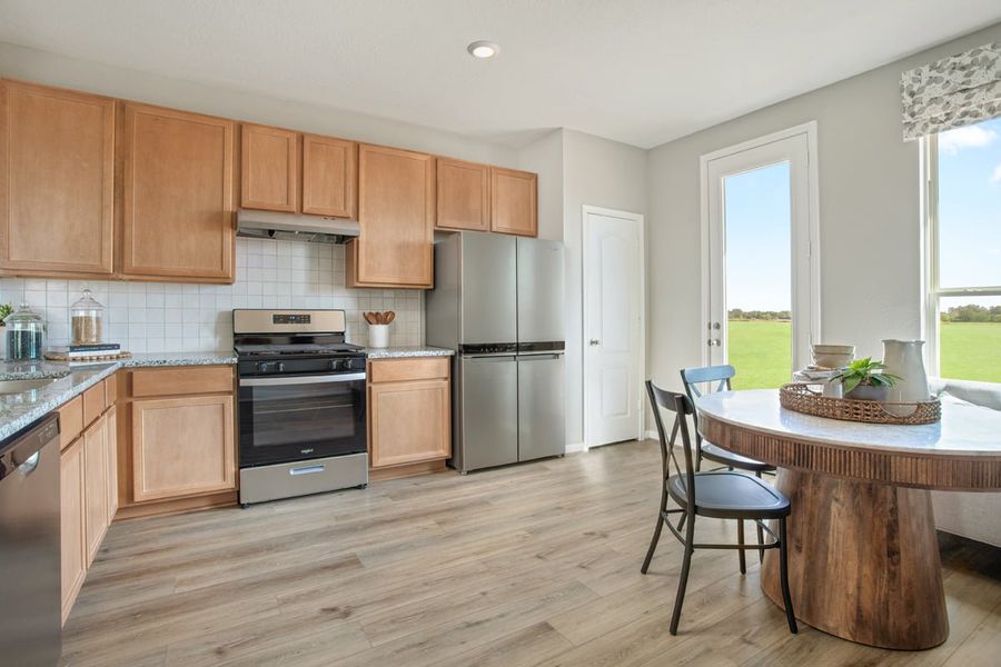 Representative furnished interior of a home built from the 1242 by KB Home in Oakwood Trails, Tomball (Image 5).