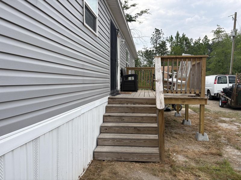 Exterior details and patio area of a home in , Cottageville (Image 25).