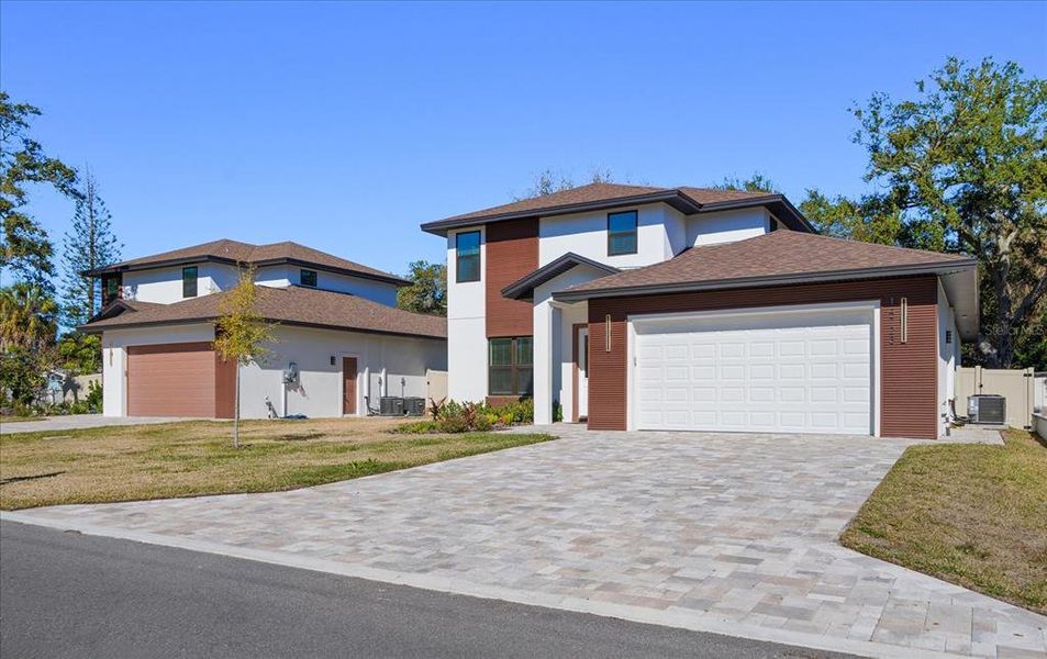 Front exterior of a new home in , Largo, FL, highlighting curb appeal (Image 28).