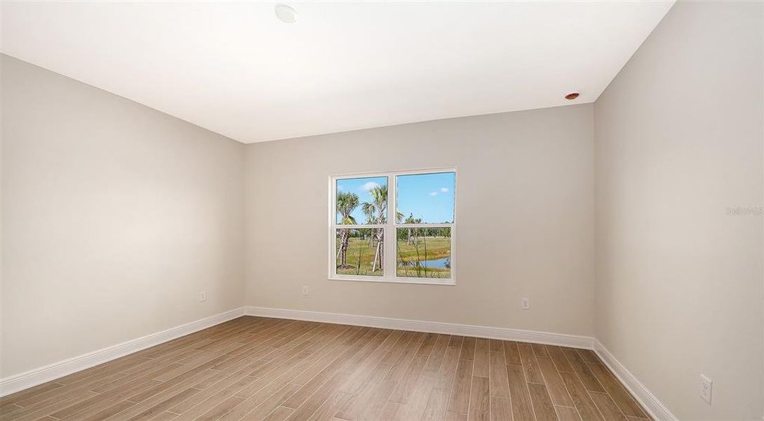 Spacious, unfurnished interior of a new home in Grand Park, Sarasota (Image 26).