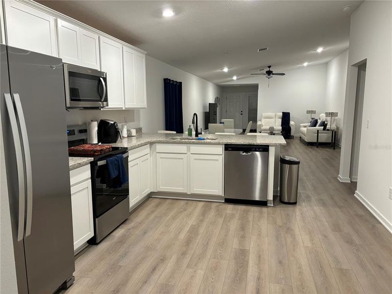 Furnished interior view inside a new home in , Tampa (Image 3). Furnished interior view inside a new home in , Tampa (Image 3).