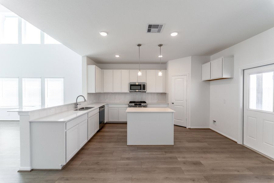 Furnished interior view inside a new home in Emberly, Beasley (Image 3).
