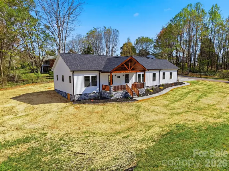 Exterior details and patio area of a home in , Lenoir (Image 22).