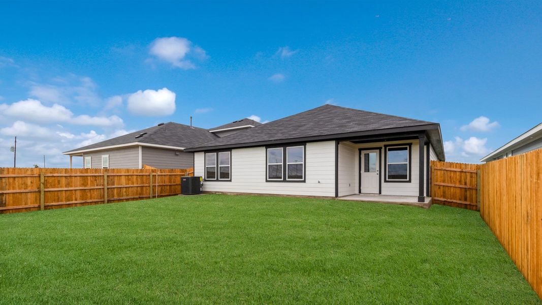 Representative exterior photo of a completed home built from the The Irvine by D.R. Horton in Monarch Ranch, Manor, TX (Image 19). Representative exterior photo of a completed home built from the The Irvine by D.R. Horton in Monarch Ranch, Manor, TX (Image 19).