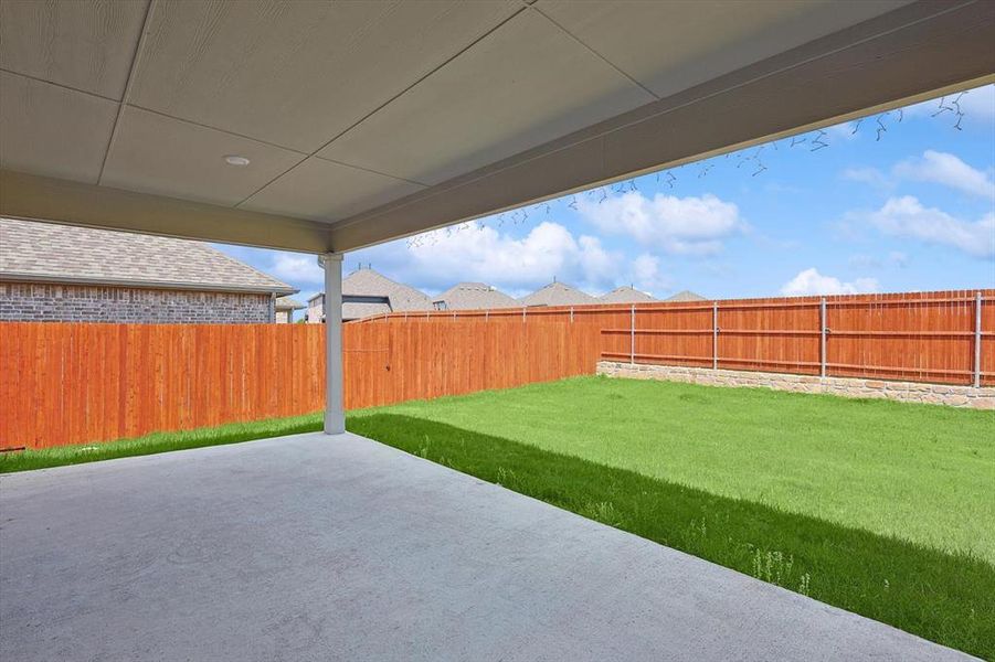 View of yard with a patio area