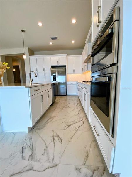 Furnished interior view inside a new home in Valencia Ridge (55+), Wesley Chapel (Image 6).