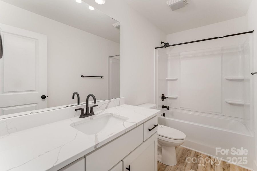 Furnished interior view inside a new home in , Hickory (Image 5).