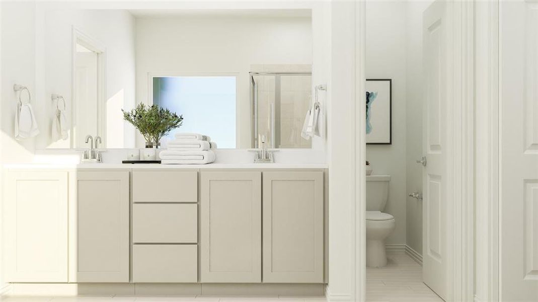 Bathroom with vanity, toilet, and an enclosed shower