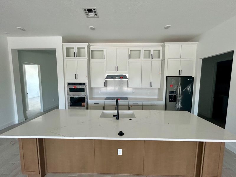 Furnished interior view inside a new home in Highpointe, Stuart (Image 6).