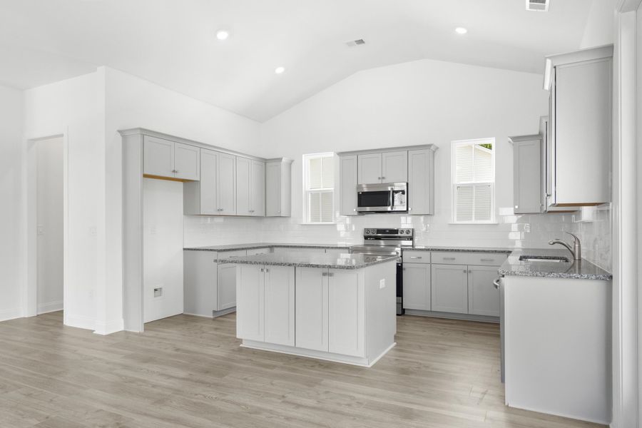 Furnished interior view inside a new home in Downtown Loris Homes, Loris (Image 6).