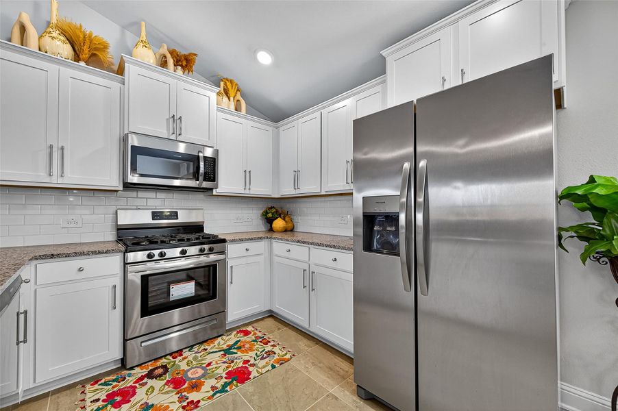 Furnished interior view inside a new home in Sunterra, Katy (Image 6).