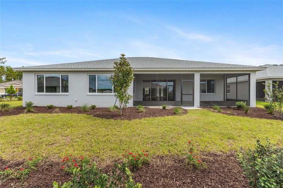 Exterior details and patio area of a home in On Top of the World Communities, Ocala (Image 4).