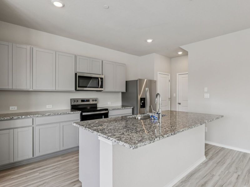 Furnished interior view inside a new home in Waterstone Village, Kyle (Image 3).