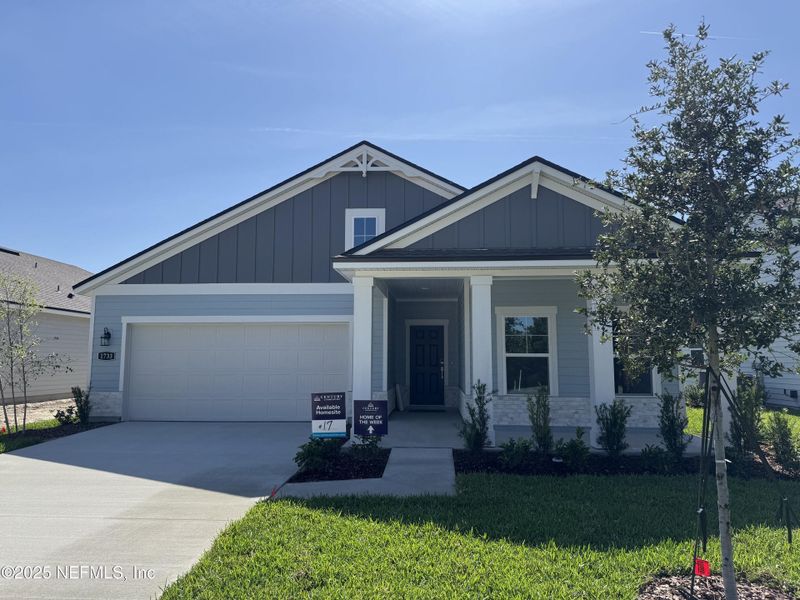 Front exterior of a new home in Oak Creek Preserve, Jacksonville, FL, highlighting curb appeal (Image 18). Front exterior of a new home in Oak Creek Preserve, Jacksonville, FL, highlighting curb appeal (Image 18).