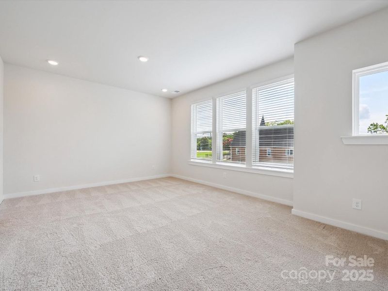 Spacious, unfurnished interior of a new home in Central Living at Craig, Charlotte (Image 25).