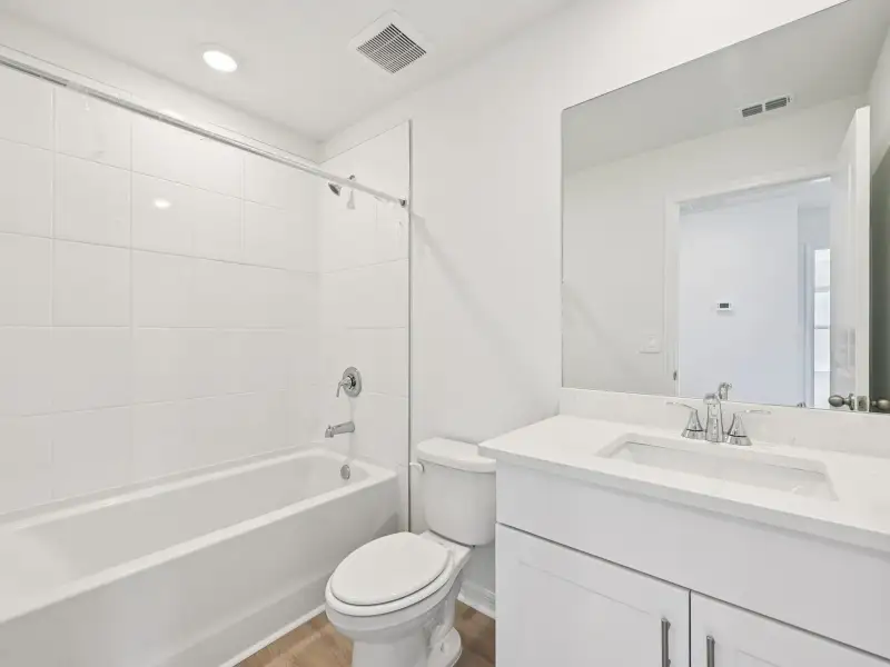 Furnished interior view inside a new home in Oakfield Trails - Premier Series, Parrish (Image 5).