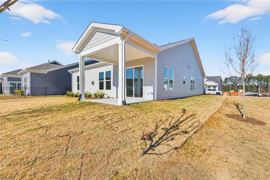 Exterior details and patio area of a home in The Reserve at Bells Ferry, Kennesaw (Image 21).