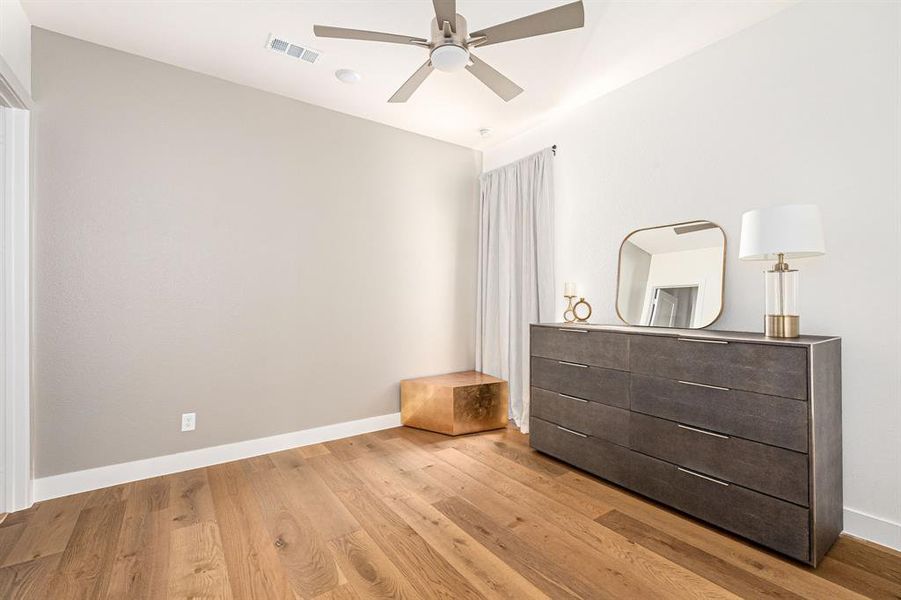 Bedroom featuring ceiling fan and light wood-style floors