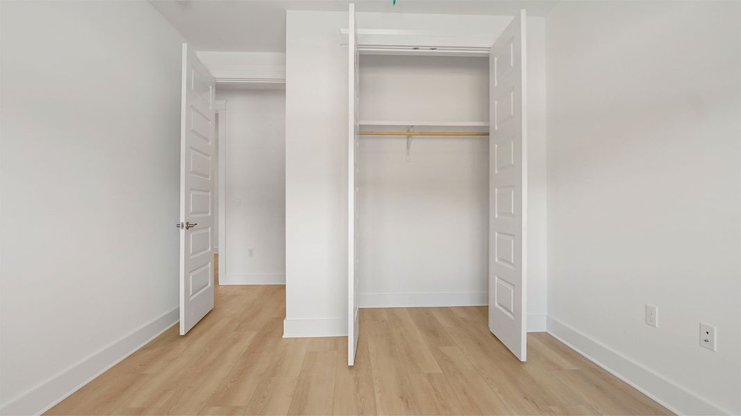 Representative unfurnished interior of a home built from the Magnolia by D.R. Horton in Breakfast Point East Phase II, Panama City Beach (Image 30).