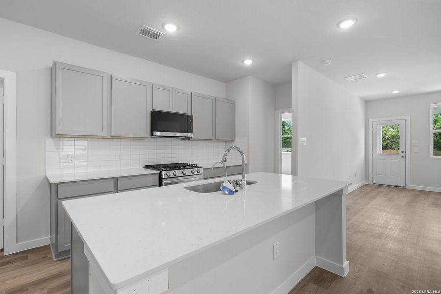 Furnished interior view inside a new home in Hacienda, San Antonio (Image 11).