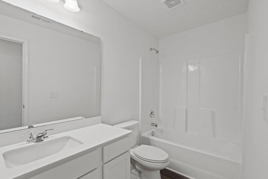 Furnished interior view inside a new home in Castlewood South, Taylor (Image 5).