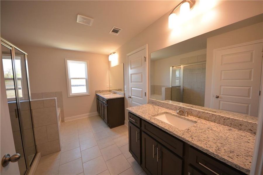 Furnished interior view inside a new home in Somerset at Riverbrook, Gainesville (Image 16). Furnished interior view inside a new home in Somerset at Riverbrook, Gainesville (Image 16).