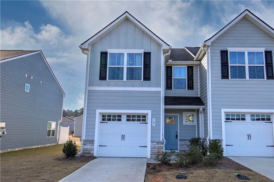 Front exterior of a new home in , Cartersville, GA, highlighting curb appeal (Image 23).