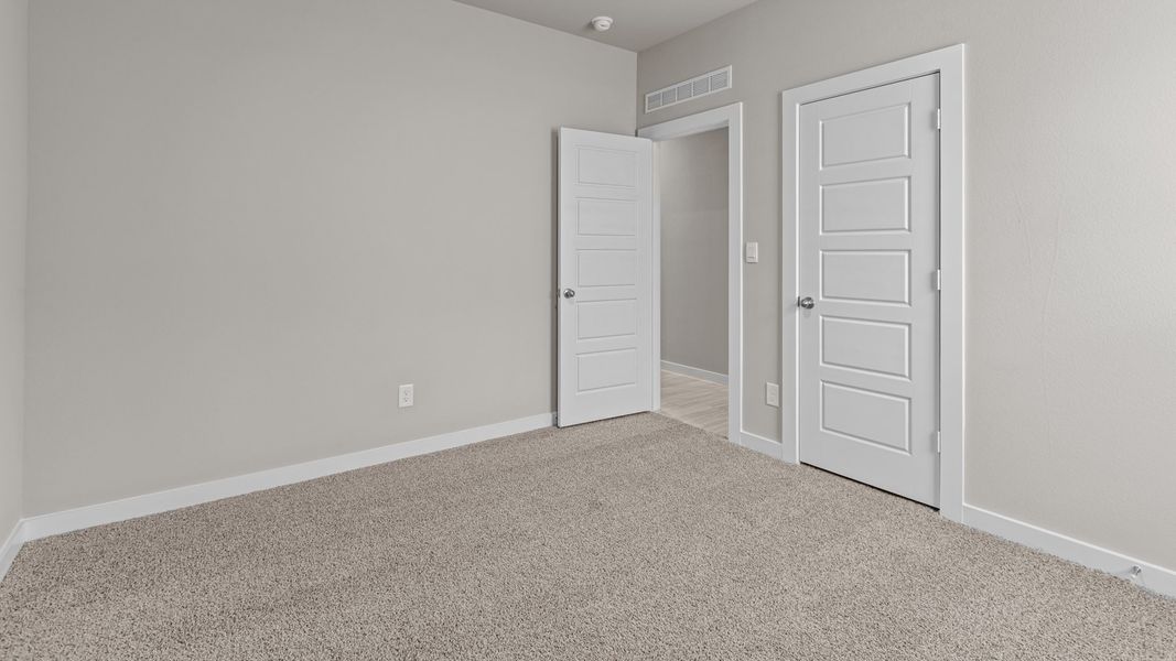 Representative unfurnished interior of a home built from the Jaxson by D.R. Horton in Legacy South, Midland (Image 27).