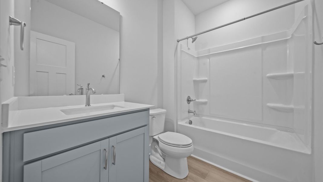 Accomplished full bath designed with both comfort and sophistication in mind Accomplished full bath designed with both comfort and sophistication in mind