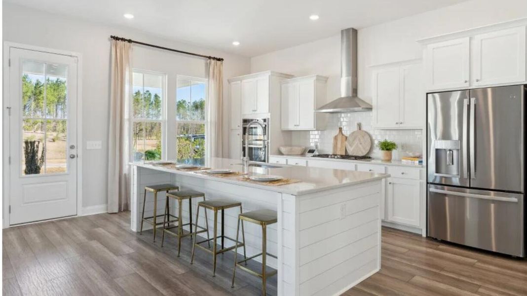 Furnished interior view inside a new home in Heron's Walk at Summers Corner: Row - Elevated Collection, Summerville (Image 8).