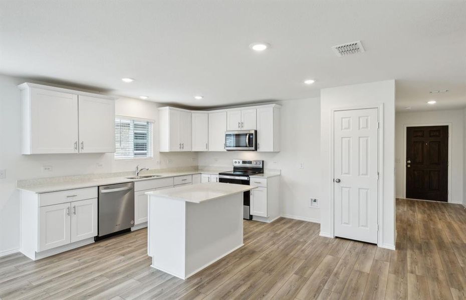 Oversized kitchen with ample cabinet space *real home pictured