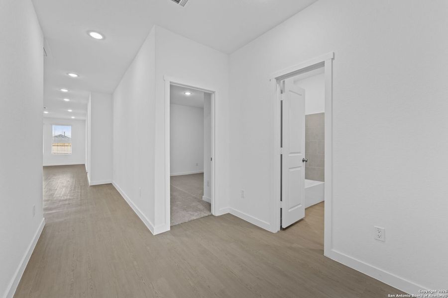 Spacious, unfurnished interior of a new home in Voss Farms, New Braunfels (Image 12).