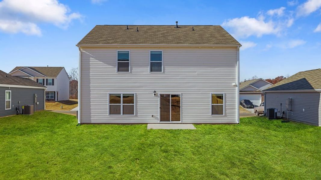 Exterior details and patio area of a home in Lightwood Cottages, Moore (Image 2).