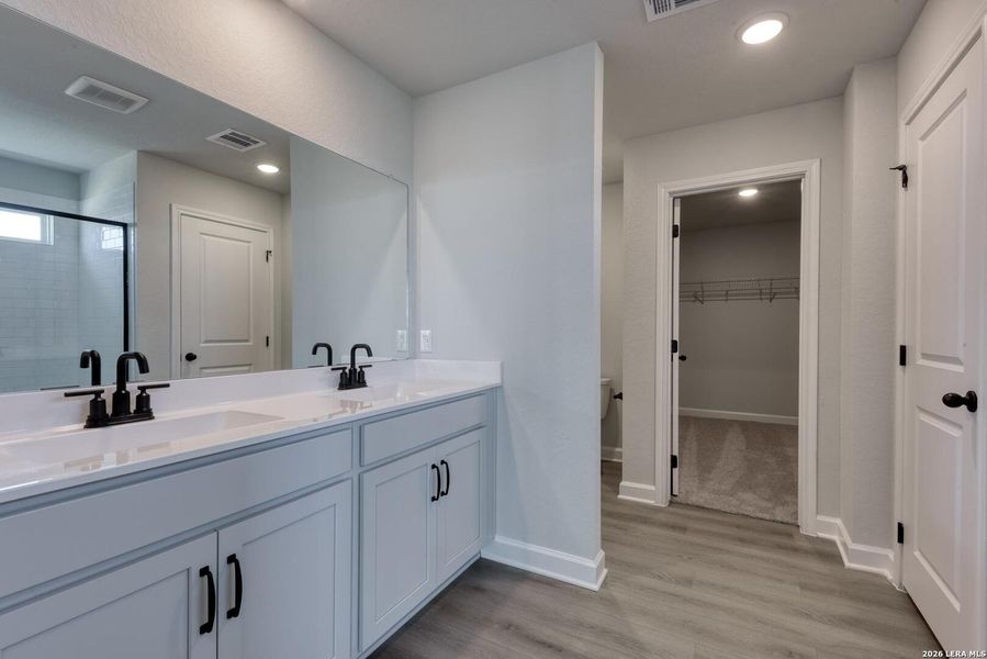 Furnished interior view inside a new home in Hennersby Hollow, San Antonio (Image 5).