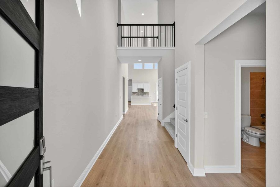 Spacious, unfurnished interior of a new home in Whisper Valley, Manor (Image 17).