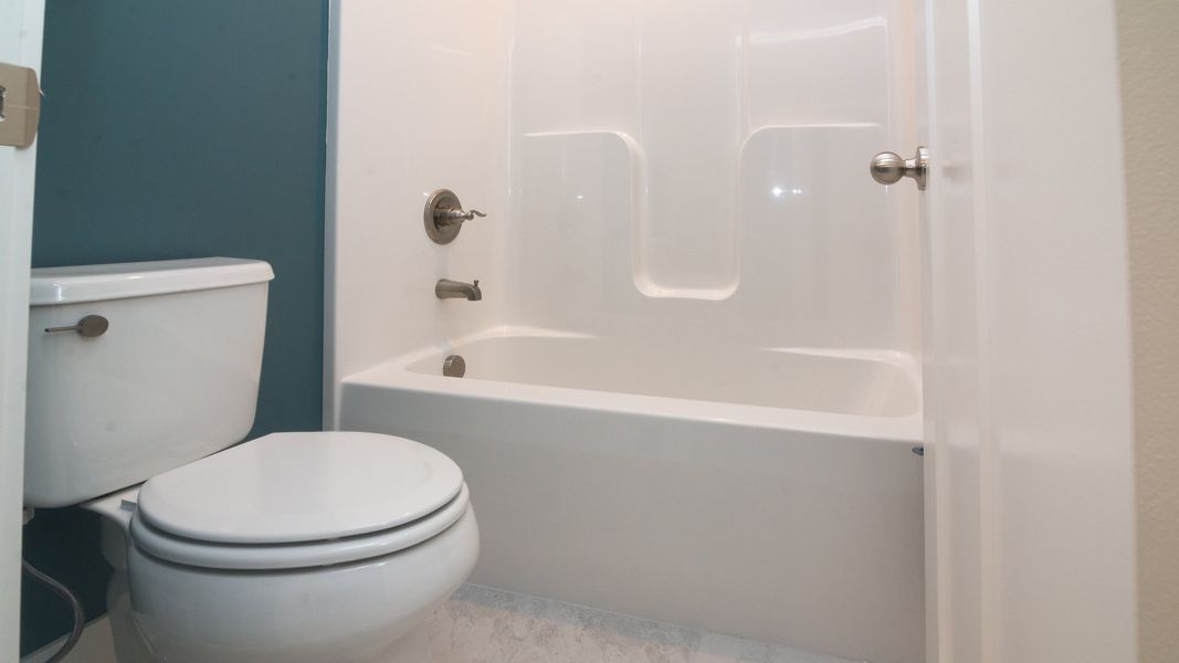 Representative furnished interior of a home built from the The Hartland by Norfolk Homes in Coronado Estates, Jackson (Image 19).