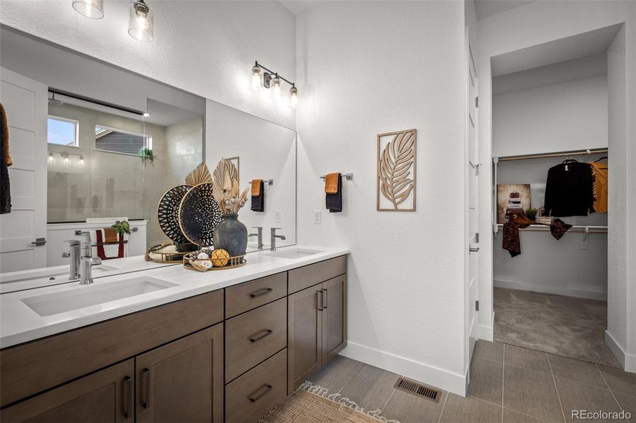 Furnished interior view inside a new home in Cloverleaf - Pinnacle Collection, Monument (Image 16).