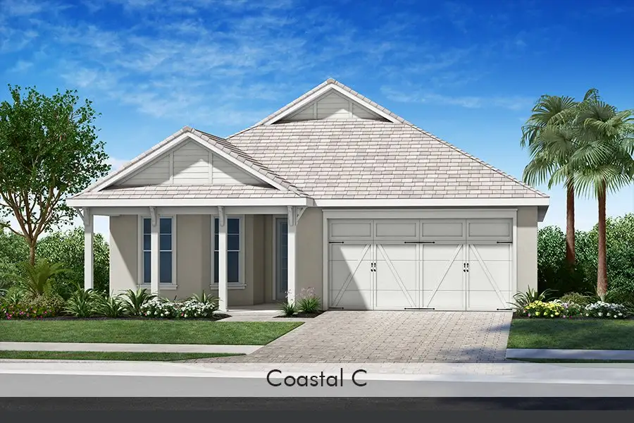 Representative exterior photo of a completed home built from the Cay by Homes by Towne in Shellstone at Waterside, Sarasota, FL (Image 11).