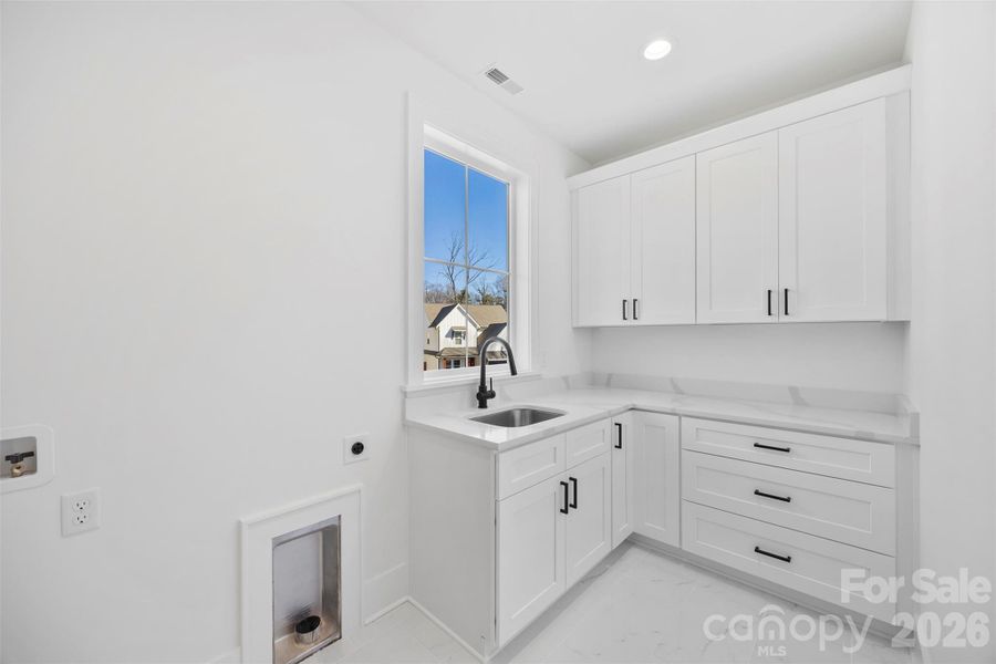 Furnished interior view inside a new home in , Charlotte (Image 32).